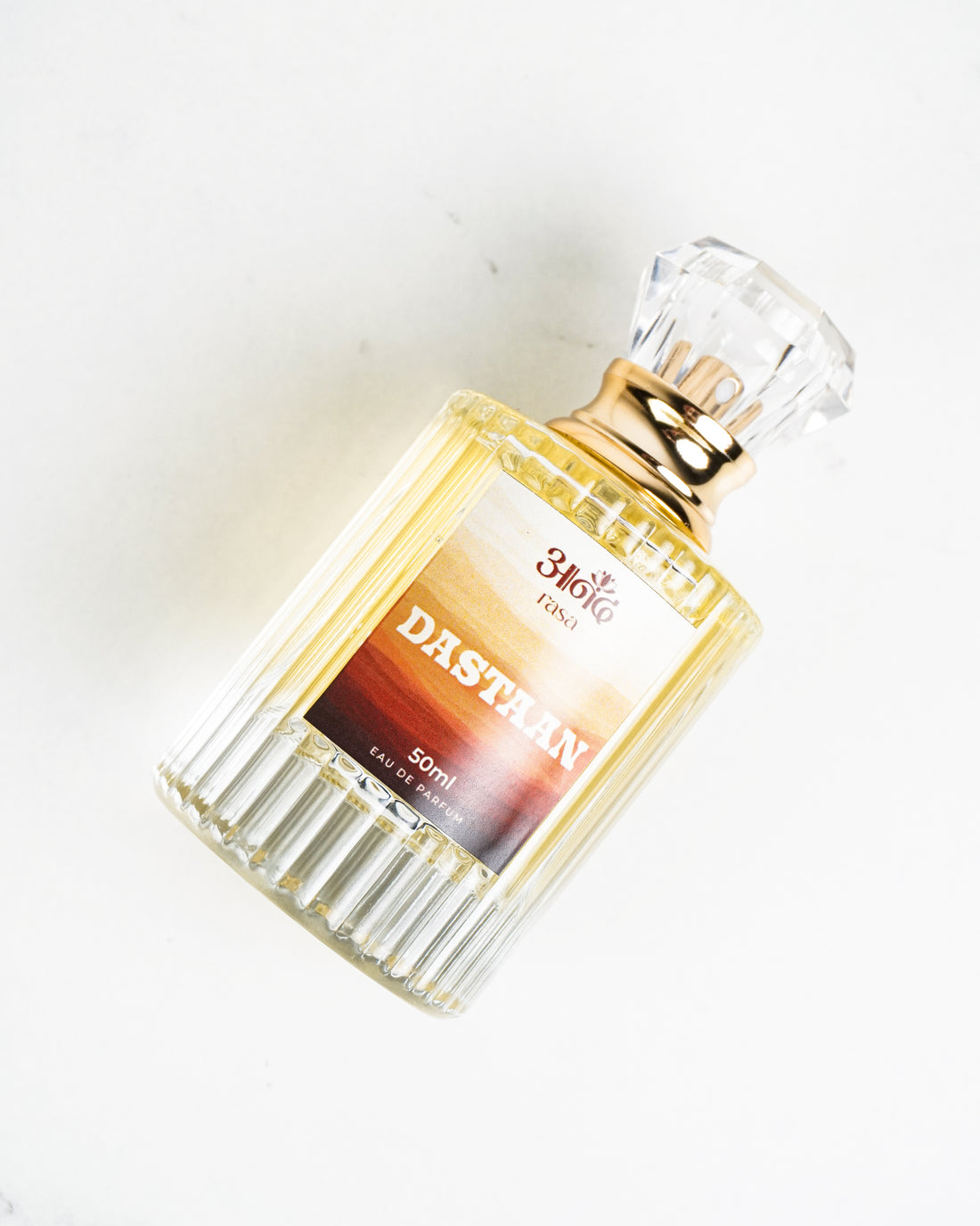 A 50ml 3Mikro Fendi Dasthan Eau de Toilette perfume bottle featuring a clear ribbed glass design, elegant gold collar, and faceted transparent cap, displayed against a clean white background.