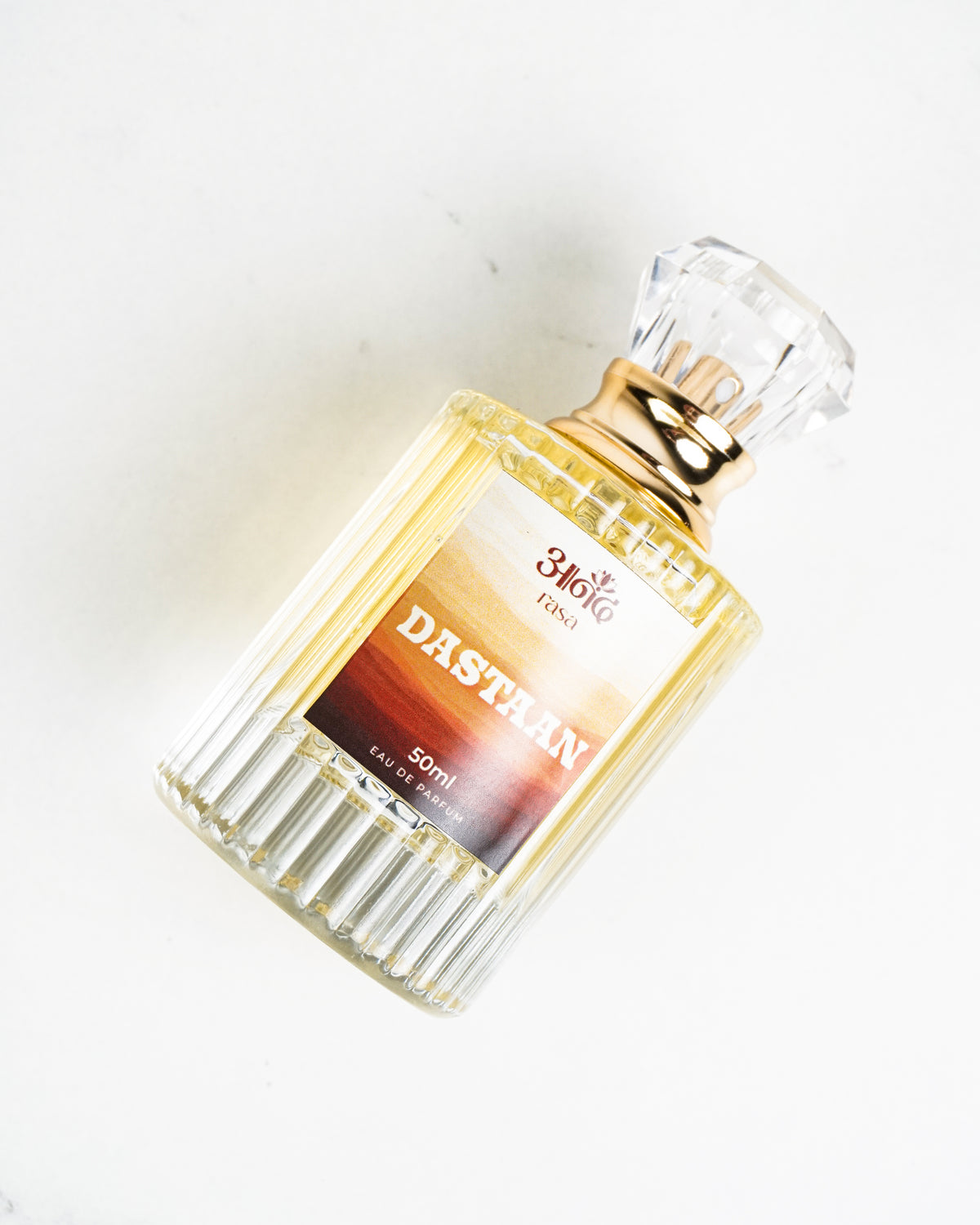 A 50ml 3Mikro Fendi Dasthan Eau de Toilette perfume bottle featuring a clear ribbed glass design, elegant gold collar, and faceted transparent cap, displayed against a clean white background.
