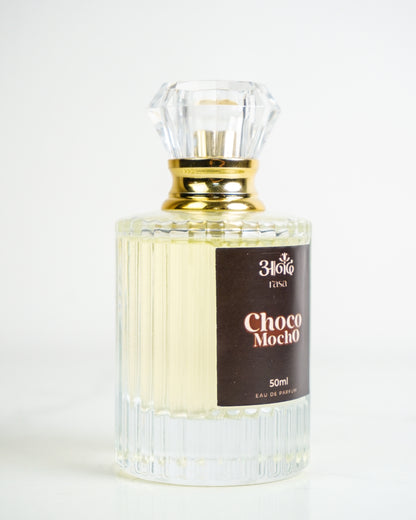A 50ml bottle of 34010 LINE Choco Mocro perfume, featuring a ribbed clear glass bottle, elegant gold cap, and dark brown Choco Mocro label, photographed on a clean white background. - handcrafted attar - Anandrasa