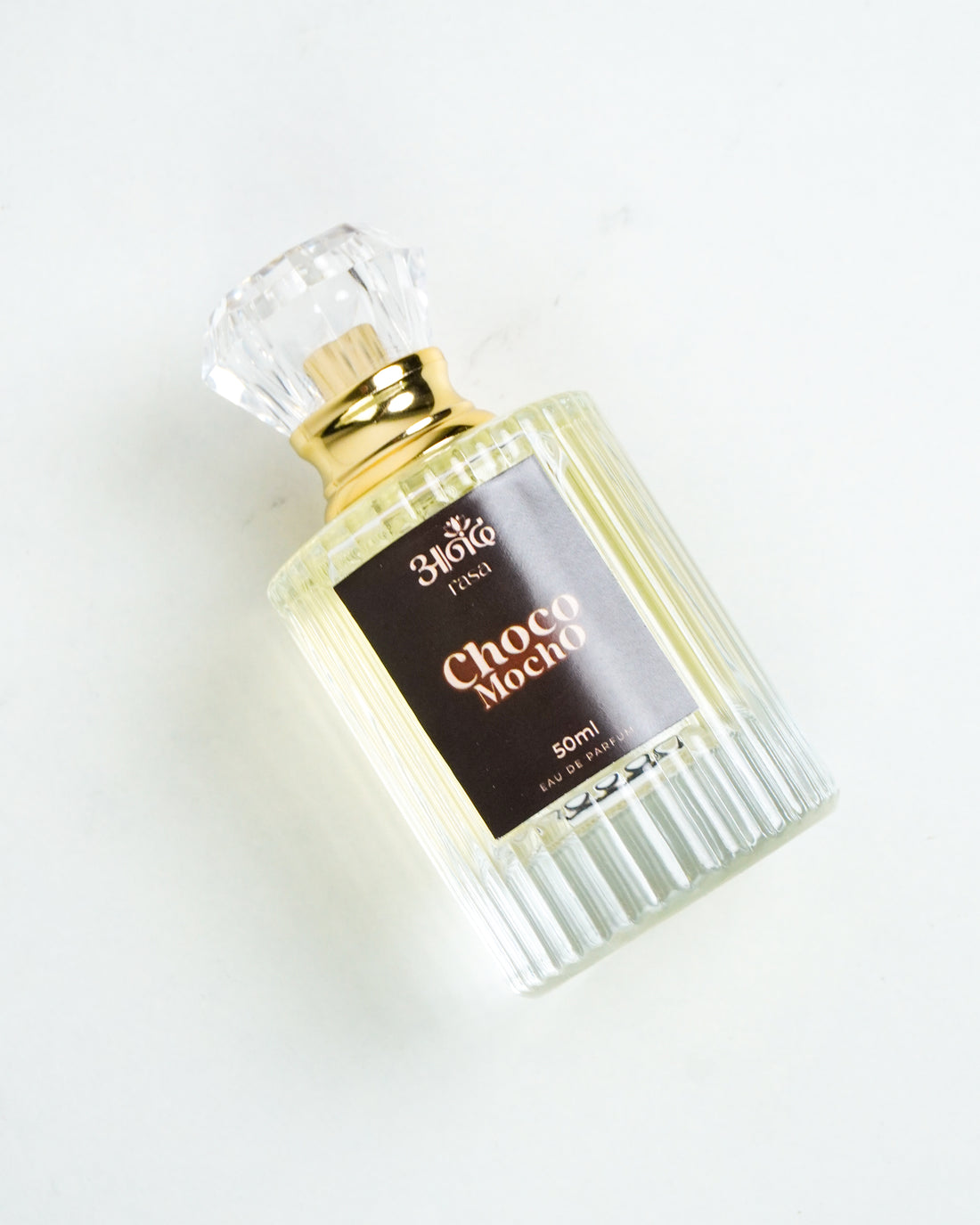 34010 LINE Choco Mocro 50ml perfume bottle with gold cap on white background