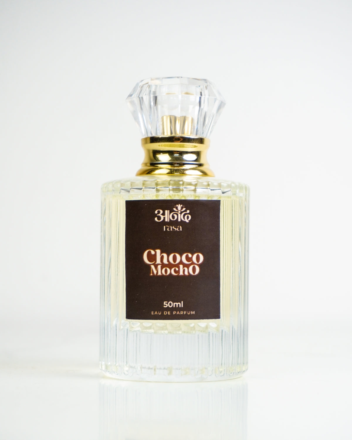 34010 LINE Choco Mocro 50ml perfume bottle with ribbed clear glass design, gold cap, and dark brown label on a clean white background.