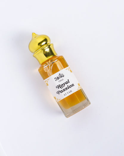 Royal Passion Attar fragrance oil bottle displayed beside a Rasa-branded jute pouch - handcrafted attar - Anandrasa