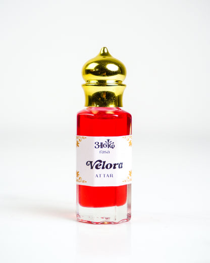 Rasa Violet Attar bottle with traditional packaging on a minimalist white background - handcrafted attar - Anandrasa